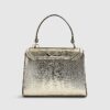 Guldfärgad mini crossbody-väska