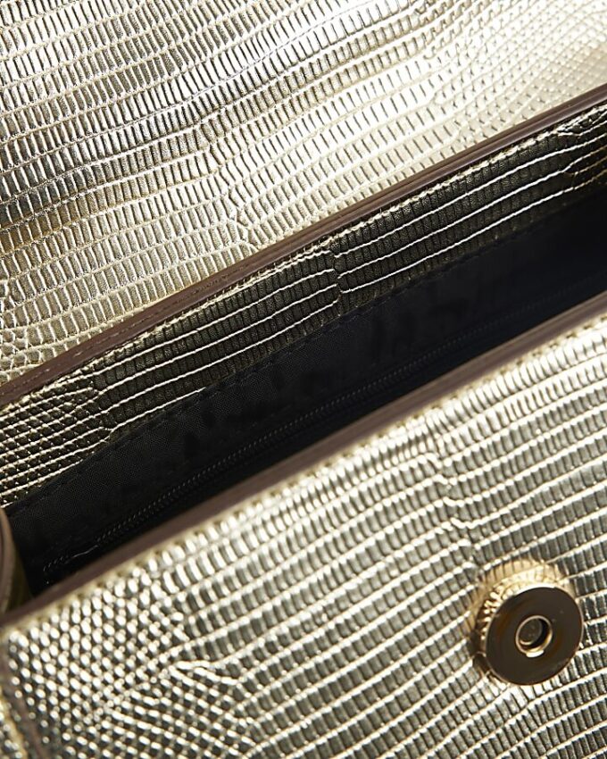 Guldfärgad mini crossbody-väska