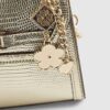 Guldfärgad mini crossbody-väska