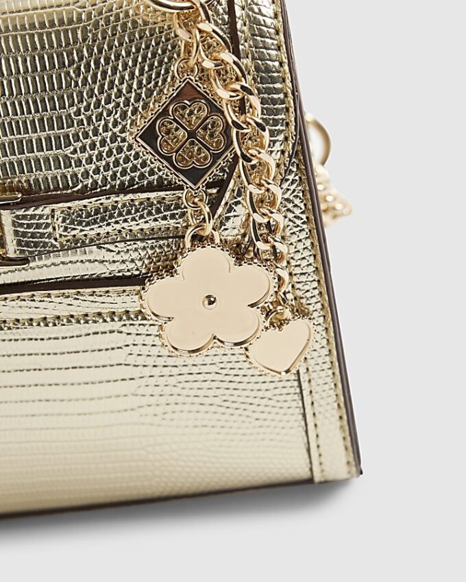 Guldfärgad mini crossbody-väska