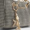 Guldfärgad sjöstjärna som bag charm