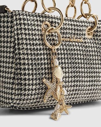 Guldfärgad sjöstjärna som bag charm