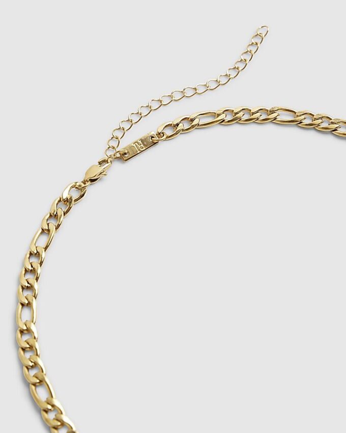 Halsband i guldfärgat stål