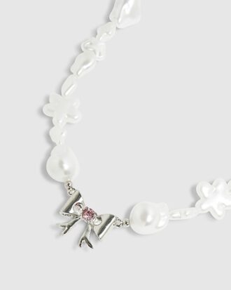 Halsband med vita pärlor och rosett för flickor
