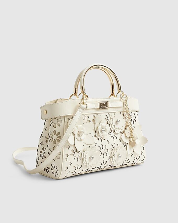 Krämfärgad 3D-laserskuren totebag med blommönster