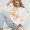 Krämfärgad blommig sweatshirt