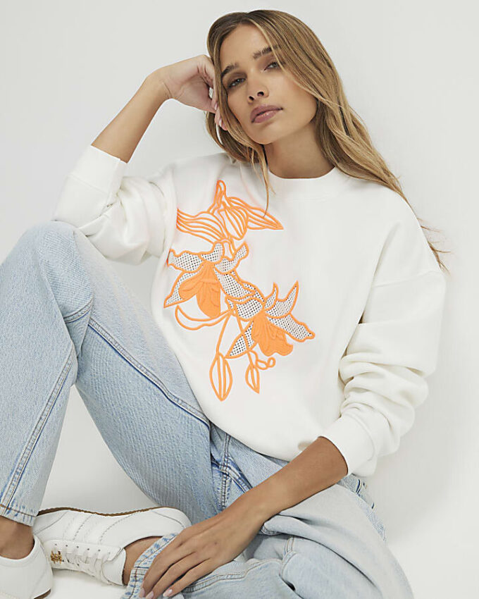 Krämfärgad blommig sweatshirt