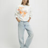 Krämfärgad blommig sweatshirt