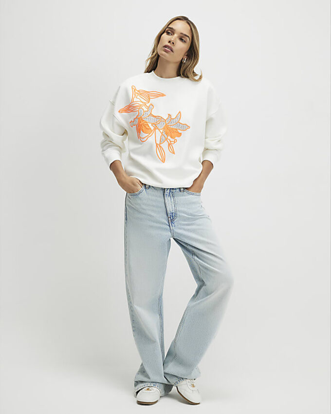 Krämfärgad blommig sweatshirt