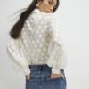 Krämfärgad blus i organza med prickar
