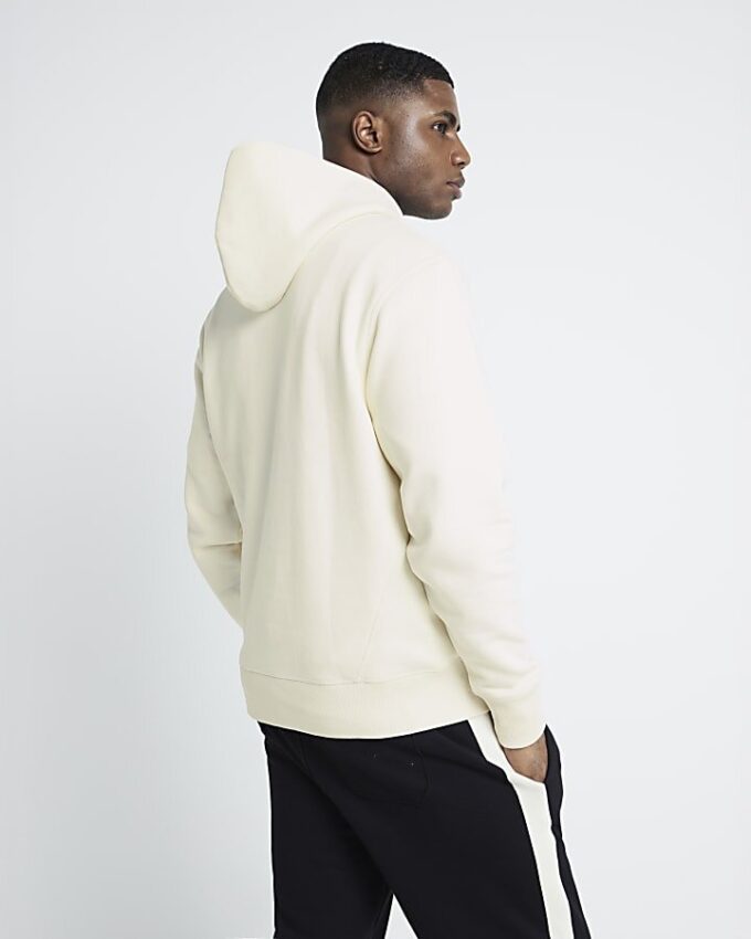 Krämfärgad hoodie med normal passform