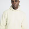 Krämfärgad hoodie med normal passform