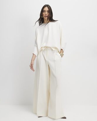 Krämfärgad långärmad batwing-top