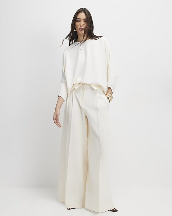 Krämfärgad långärmad batwing-top