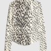 Krämfärgad långärmad ribbad topp med leopardmönster