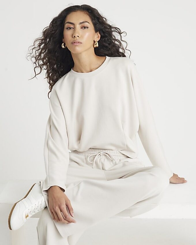 Krämfärgad premium-långärmad batwing-tröja