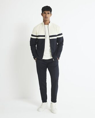 Krämfärgad slim fit-jacka med färgblock