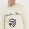 Krämfärgad slim fit-tröja med broderi