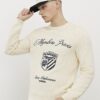 Krämfärgad slim fit-tröja med broderi