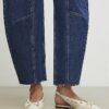 Krämfärgade pumps med rosett och slingback