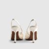 Krämfärgade slingback-klackar med virkade detaljer