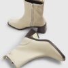 Krämfärgade stretchiga sockboots med blockklack