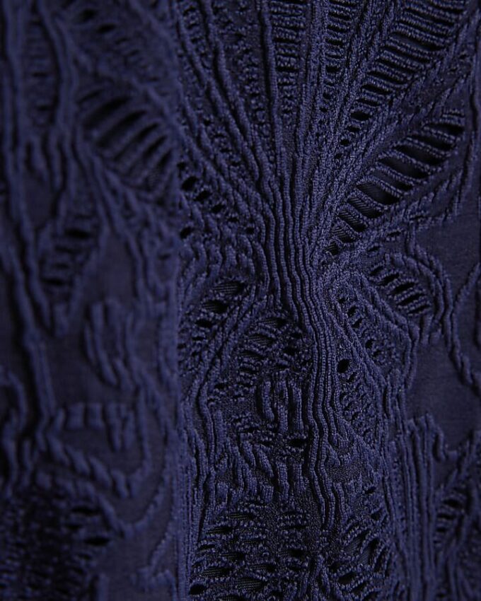 Marinblå baddräkt med texturerad snäckkant