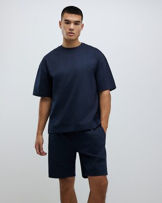 Marinblå boxy fit-T-shirt och shorts i set