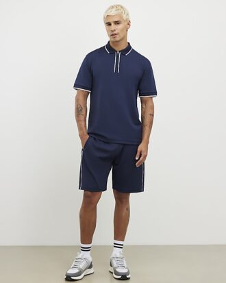 Marinblå slim fit-polotröja med textur och dragkedja
