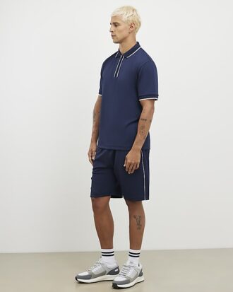 Marinblå slim fit-shorts med texturerad kant