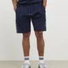 Marinblå slim fit-shorts med texturerad kant