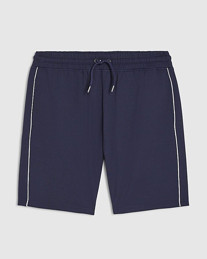 Marinblå slim fit-shorts med texturerad kant