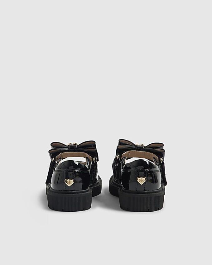 Mini Girls svarta Mary Jane-skor med remmar och rosett