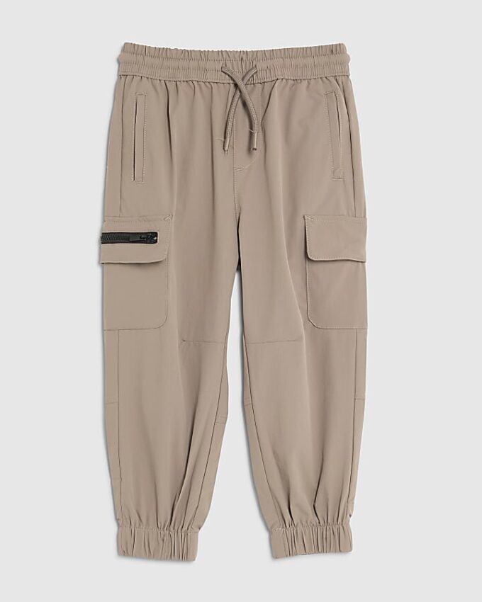 Mini pojkbyxor i beige med dragkedja