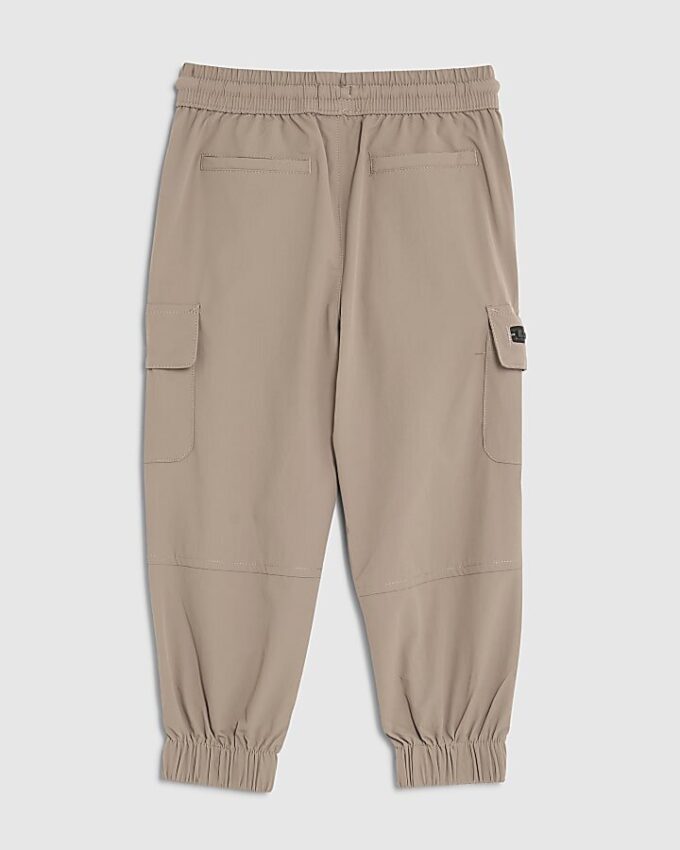 Mini pojkbyxor i beige med dragkedja