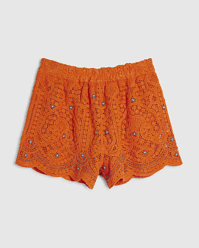 Orange strandshorts med virkade detaljer