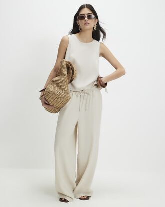 Petite beige linneblandade vida byxor