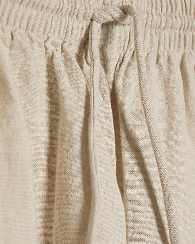 Petite beige linneblandade vida byxor