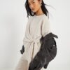 Petite beige mysig topp med breda ribbor och knut på sidan