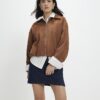 Petite blå denimjerseyminikjol