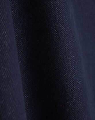 Petite blå denimjerseyminikjol