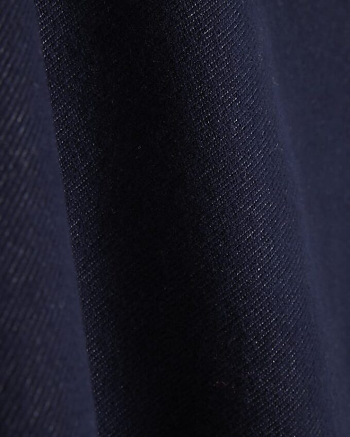 Petite blå denimjerseyminikjol