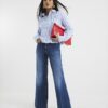 Petite blå högmidjade avslappnade flare-jeans Petite blå högmidjade avslappnade flare-jeans