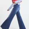 Petite blå högmidjade avslappnade flare-jeans Petite blå högmidjade avslappnade flare-jeans