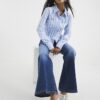 Petite blå högmidjade avslappnade flare-jeans Petite blå högmidjade avslappnade flare-jeans