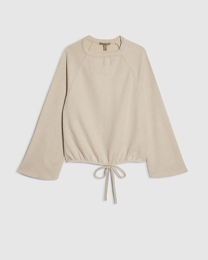 Petite krämfärgad mysig ribbstickad topp med bubbelkant