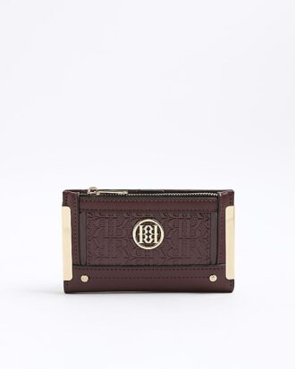 Röd handväska med präglat RR-monogramtryck