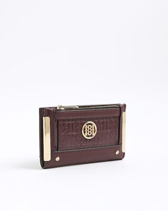 Röd handväska med präglat RR-monogramtryck