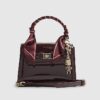 Röd mini-crossbody-väska i lackläder