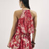 Röd playsuit med blommiga dekorationer